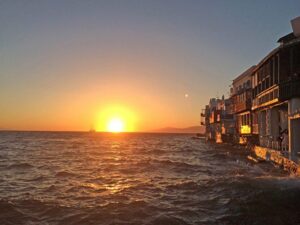 Mykonos: Sunset Cruise with Drinks - The sail out: views of Mykonos and Little Venice from a new angle
