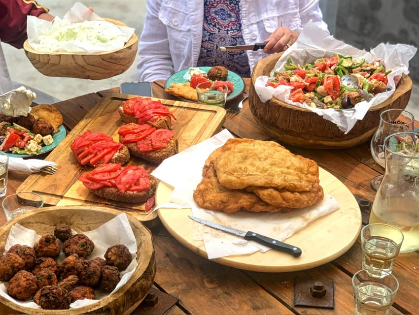 Mykonos: Traditional Cooking Class with the Locals - A relaxed outdoor setting with limited shade
