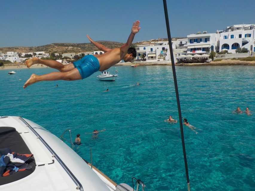 Naxos: Catamaran Cruise with Swim Stops, Food, and Drinks - Lunch onboard: traditional food, vegetarian options, and real refreshment