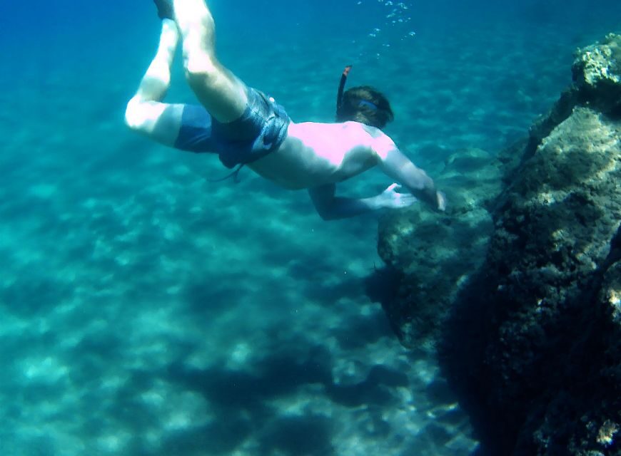 Naxos: Rhina Cave and Coastline Sea Kayaking Tour - Returning to Kalandos: where wind changes the mood