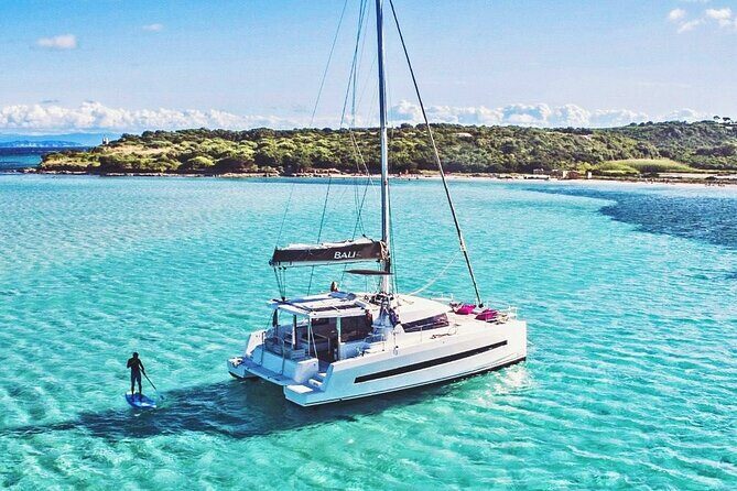 Panormo: Luxury Catamaran Cruise with Lunch & Open Bar - The water break in Crete: SUP, snorkeling gear, and the flamingo float