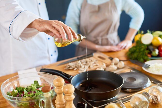 Paros: Cooking Class with Greek Meal & Wine - Welcome moment: wine, aprons, and a quick dance lesson