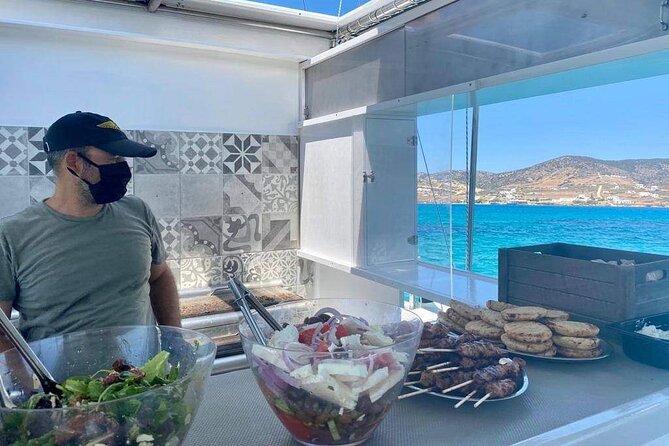 Paros Cruise to Antiparos & Despotiko with Traditional Boat - The rock-jumping stop is optional fun