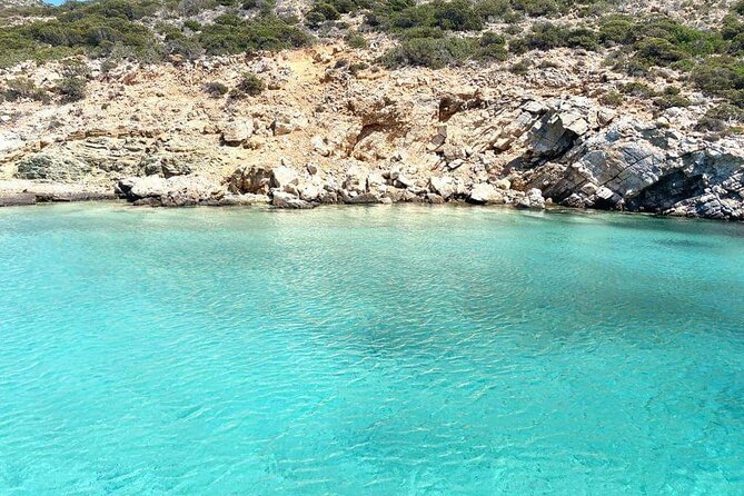 Paros Cruise to Antiparos & Despotiko with Traditional Boat - Parian food, fruit, and controlled wine service