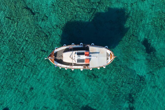 Paros Half Day Boat Tour from Naoussa port and Bay . - Snorkeling reality check: gear helps, but fish aren’t guaranteed