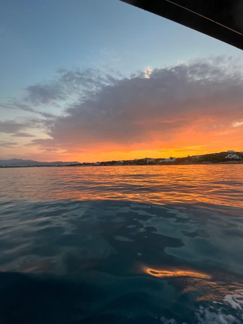 Paros: Sunset Boat Tour to Antiparos with Wine - Despotiko at Sunset: Ancient Ruins Under a Falling Sky