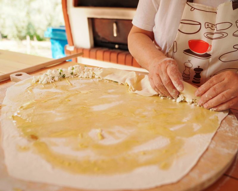 Phyllo Pie Baking Class @ Lefkada Micro Farm - Baking in the traditional wood-burning oven