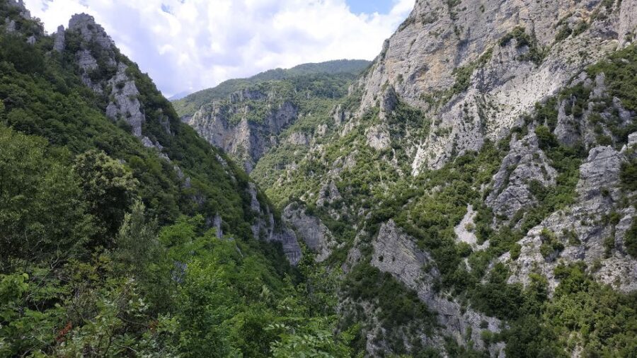 Pieria: Guided Hiking Tour in Enipeas Gorge of Mount Olympus - Inside Enipeas Gorge: waterfalls, wooden bridges, and easy trail signs