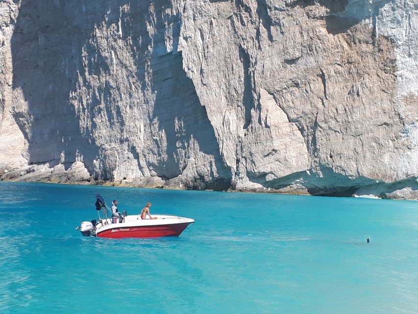 Porto Vromi: Navagio Beach & Blue Caves Private Boat Tour - Swimming and snorkeling along the hidden bays