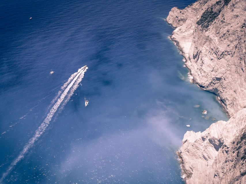 Porto Vromi: Navagio Shipwreck Cruise with Sunset Viewing - Caves, rock shapes, and quiet bays