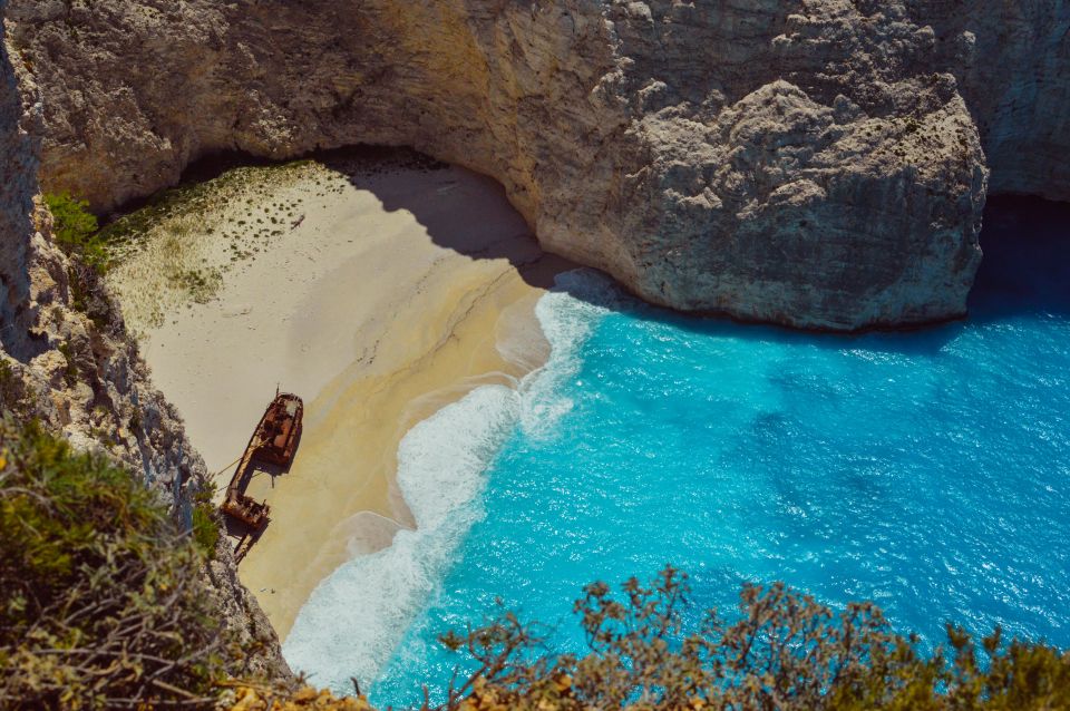 Porto Vromi: Navagio Shipwreck Cruise with Sunset Viewing - Sunset from a secluded bay