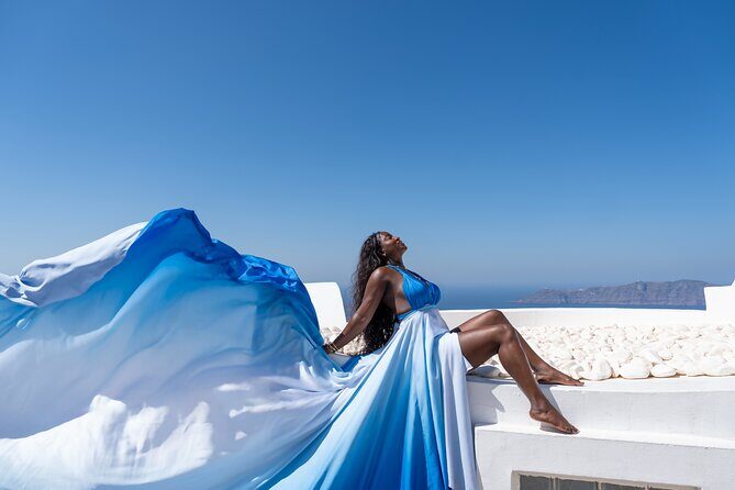 Premium Flying Dress Photoshoot Santorini with Pick up&Drop off - The Iconic Backdrops: Caldera, Volcano, Blue Domes, and the Sea