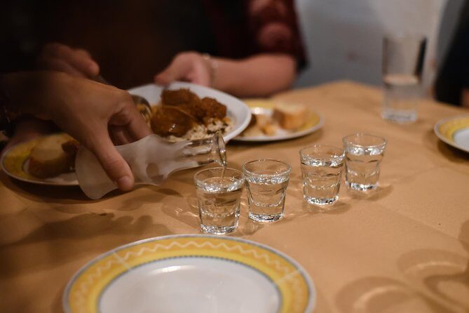 PREMIUM Semi-Private Athens Afternoon Food Tour & Wine Tasting - Stop 4 on Mitropoleos Street: the dinner course with Greek salad and spirits