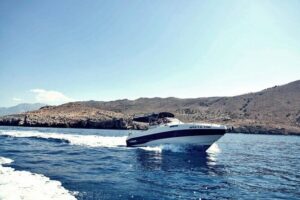 Private Boat Tours in Kalyves and East Coast - The crew makes it: Dimitris planning, Manolis at the helm