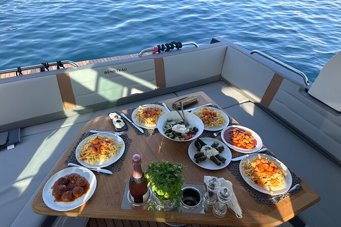 Private Caldera Cruise with Motor Yacht in Santorini - Ammoudi Bay below Oia