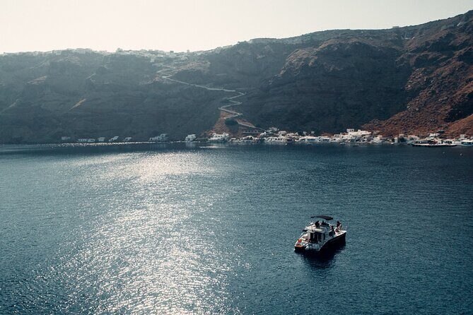 Private Caldera Cruise with Power Catamaran ENJOY incl. Meal & Drinks - Your Greek meal aboard: BBQ choices, fruit, dessert, and drinks that keep flowing
