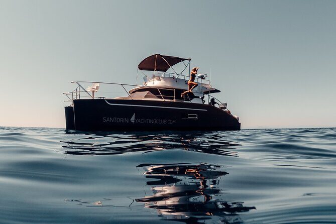 Private Caldera Cruise with Power Catamaran ENJOY incl. Meal & Drinks - White Beach and Red Beach: the volcanic postcard route