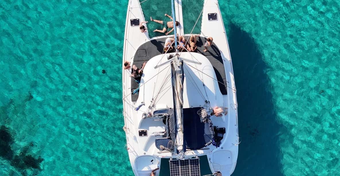 Private Catamaran Cruise Mykonos Delos with Meals & SUP - Rhenia’s coves are the heart of the afternoon