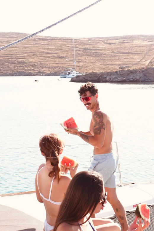 Private Catamaran Cruise Mykonos Delos with Meals & SUP - Lunch on board, with Greek hospitality