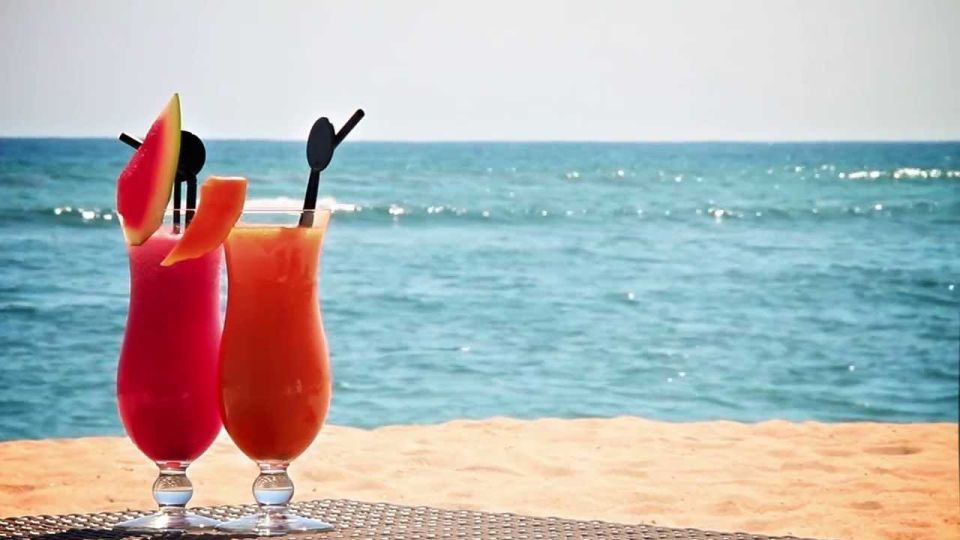 Private Corfu Beach Exploration: Enjoy Sun & Sea - Ipsos: shallow water with a livelier roadside setting