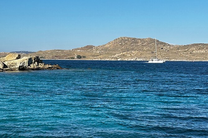 Private Cruise with Handmade Antique Boat around Mykonos-Full Day - Super Paradise and Paradise show two sides of beach culture