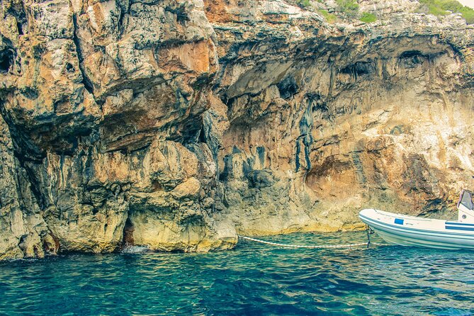 Private Day Trip to the most beautiful beaches of Rhodes on a traditional boat - Traounou Beach: the natural cave stop