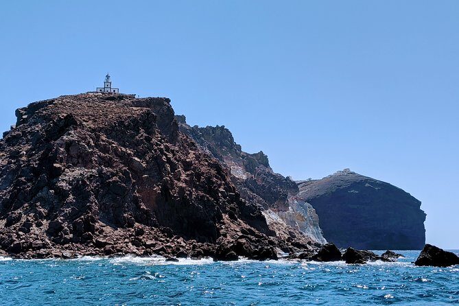 Private Full-Day Motor Yacht Cruise with Meal, Open Bar+Transfers - Thirasia snorkeling and the Oia sunset option for an afternoon finish