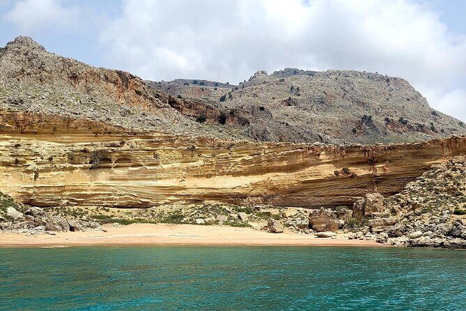 Private Full/Half-Day Boat Trip in Greece with Food and Drinks - Stop 1 Lindos: Sails, Steering, and an Easy Pace