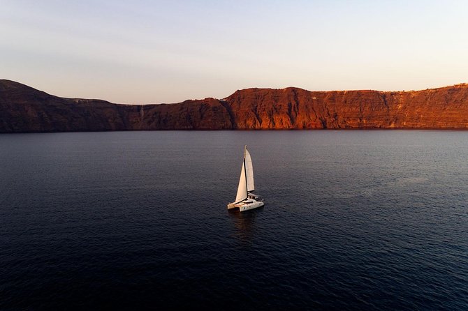 Private Luxury Caldera Cruise with a rich BBQ meal and Open Bar! - Swimming, Snorkeling, and Time at Anchor