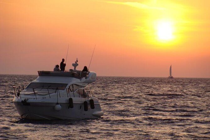 Private Motor Yacht Cruise with BBQ, Open Bar & Transfers - Stop-by-stop: Red Beach and White Beach (the boat-only part)