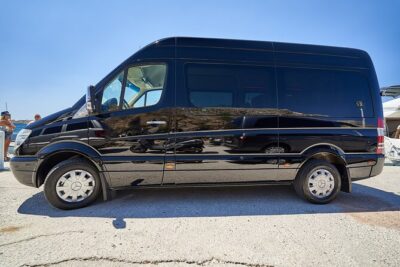 Private Mykonos Airport/Port Luxury Transfer-Taxi - Arriving at Mykonos port with bags in tow