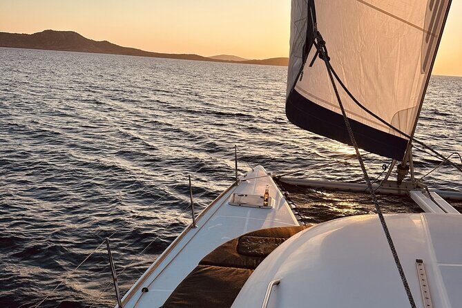 Private Mykonos Catamaran Day Cruise with Meals & Water Toys - Delos Stop: Famous Greek Ruins, Seen From the Right Angle