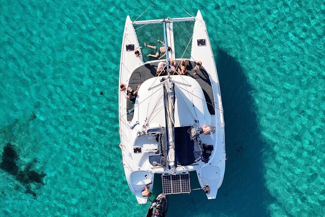 Private Mykonos Catamaran Day Cruise with Meals & Water Toys - Water Toys and Swim Time: Snorkeling, SUP, and Real Play