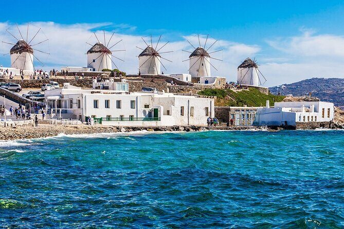 Private Mykonos Tour with Luxury car - Stop 1: Armenistis Lighthouse and the Tinos Connection