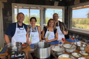 Private Santorini Cooking Class & Wine Tasting Tour - Stop 2 at Santo Winery: more pours, more varietals, plus caldera views