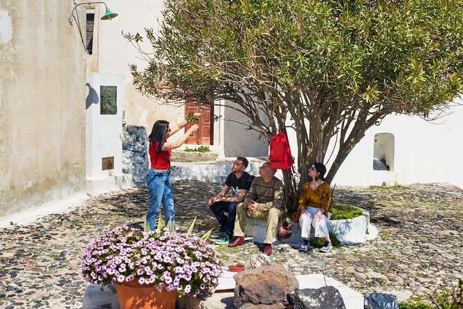 Private Santorini Villages Morning Walking Tour inc. tastings - Firostefani with ice cream in hand