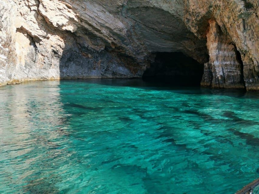 Private Sunset Cruise at Mizithres - Keri and Oasis beach rock formations: where swimming meets cave-like scenery