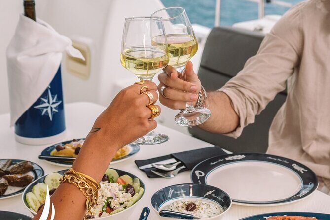 Private Sunset Cruise with Full Greek Dinner - Volcano sailing and the Palia Kammeni hot springs swim