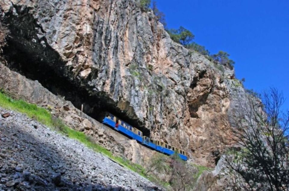 Private Tour to Ancient Corinth, Cave of Lakes & Cog Railway - Boarding the Odontotos rack railway in Diakofto
