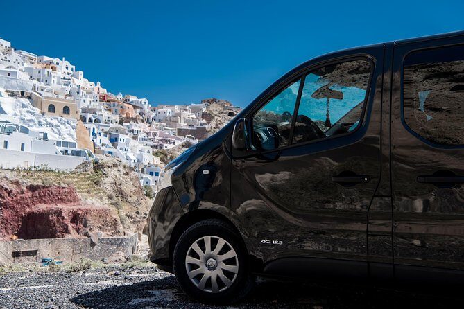 Private Transfer from-to Santorini airport to-from anywhere in Santorini Island - How the Name-Sign Pickup Cuts Through Airport Chaos