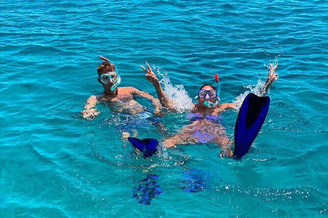 Rethymno Catamaran Cruise: Healthy Lunch & Open Bar - Water Time on Your Terms: SUP, Snorkeling, Fishing, and the Flamingo