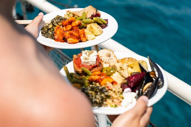Rhodes Bay to Bay Swim Cruise-Greek Buffet w/wine included - Afandou Beach: a long pebble shoreline and caves before lunch
