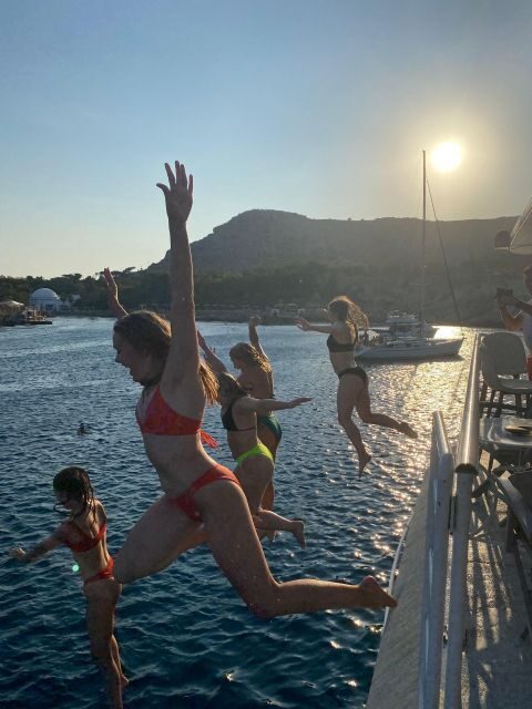 Rhodes: Bay to Bay Swim Cruise with Greek Buffet and Wine - Afandou and the Traganou Area: Beach Stretch, Caves, and Lunch Timing