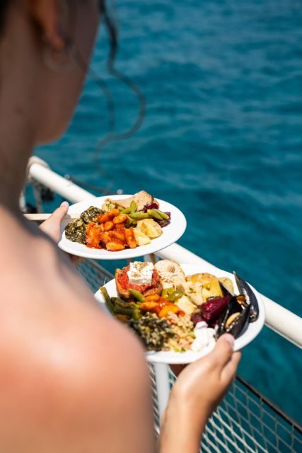 Rhodes: Bay to Bay Swim Cruise with Greek Buffet and Wine - Deck Comfort and the Soundtrack: When the Boat Feels Like the Activity