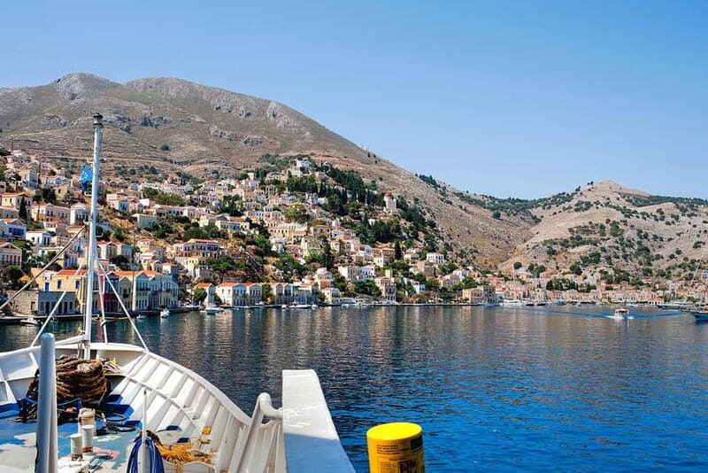 Rhodes: Boat trip to Symi island with swimming at St. George - Rhodes pickup, coach time, and the multiple drop-off reality
