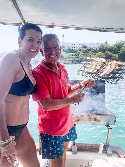 Rhodes: Captain Manolis Fishing Trip with BBQ and Swimming - Swimming and snorkeling: clear water, simple fun