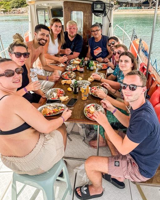 Rhodes: Captain Manolis Fishing Trip with BBQ and Swimming - BBQ on board: Greek salad, bread, and fresh fish