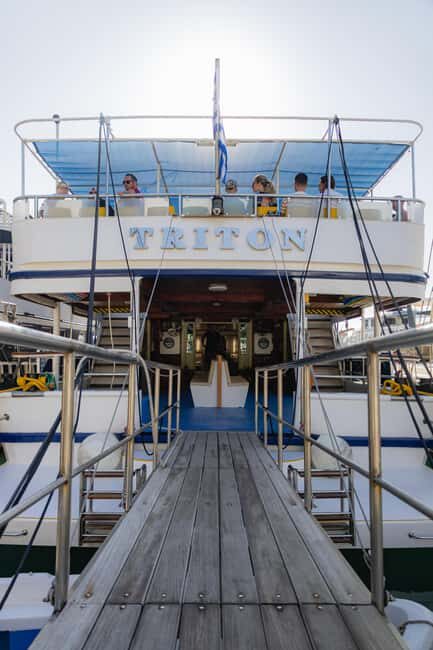 Rhodes: Daily Cruise to Lindos - The onboard setup: air-conditioned comfort, WC, floats, and a bar