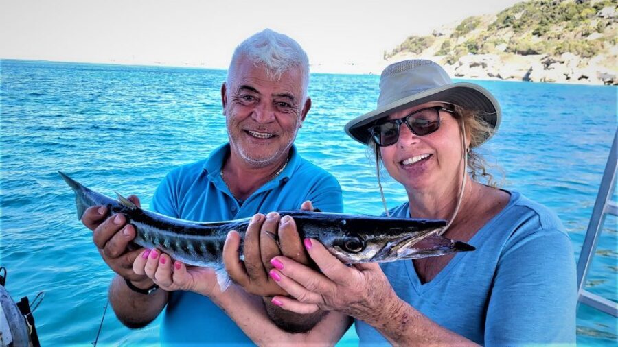 Rhodes: Fishing Trip, Snorkelling, BBQ, & Professional Guide - The Quiet Bay Stop: Swim and Snorkel Without the Rush