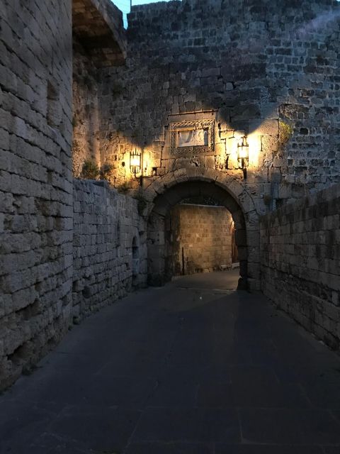 Rhodes: Guided Rhodes City By Night with Live Music & Dinner - Pickup coverage from resorts and cruise ships